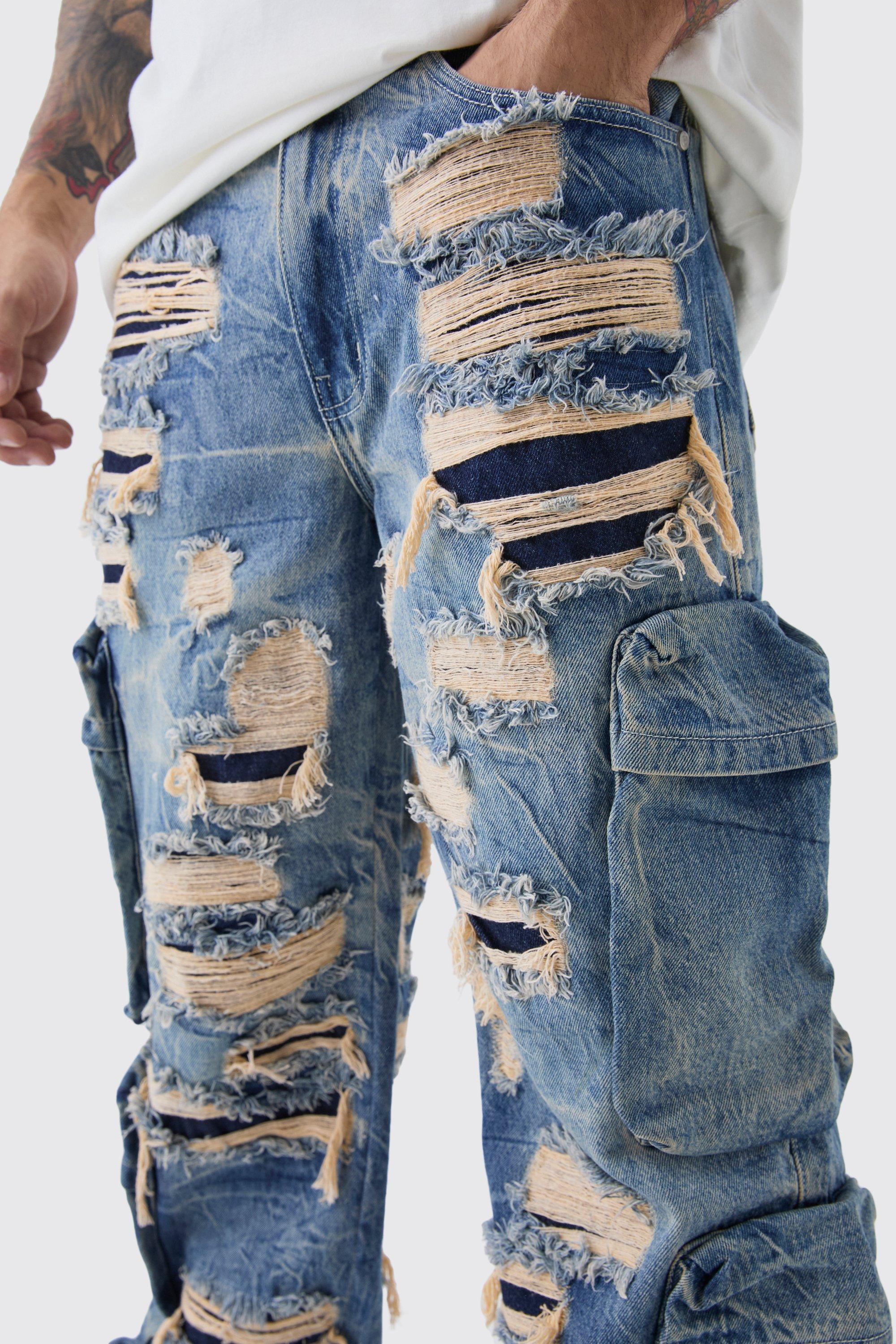 Relaxed Fit Cargo All Over Ripped Jeans | boohoo